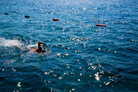 Swimmer  Men Swimming in the Lake  Summer Recreation  Clear Blue Water のeditorial素材