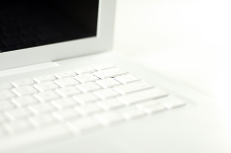 White Laptop Computer on the White Background.