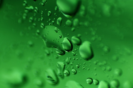 Green Drops on the Glass  Water on the Glassの写真素材