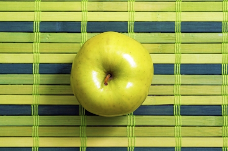 Green Apple on Green Pattern Matt. Top View. Diet Theme. Food Photo Collection.の写真素材