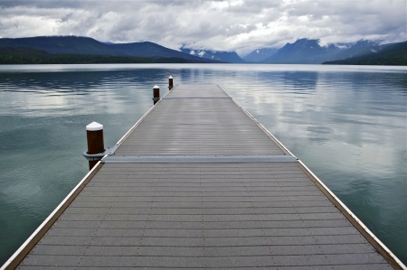 Lake McDonald Montana\'s Glacier National Park. Wood Floating Dock. Lake McDonald is the Largest...