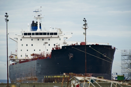 Servicing Large Commercial Container Ship - Transportation Photo Collection.のeditorial素材