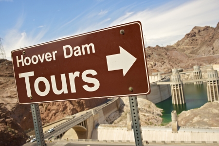 Hoover Dam Tours Sign and Hoover Dam (Nevada/Arizona Border USA) in Background. Nevada Photography Collection.のeditorial素材