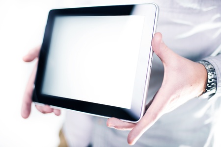 Tablet Computer in Hands. Young Male Hands. Showing Tablet Computer. Computer technology Photo Collection. White Backgroundの写真素材