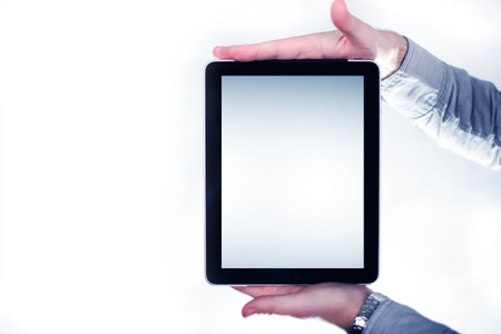 Tablet in Hands ( Male Hands ) in Vertical Position - White Background. Modern Computer Technology Photography Collection.の写真素材