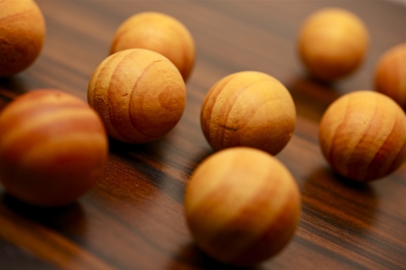 Wood Balls on the Wood Table. Decoration Elements.の写真素材