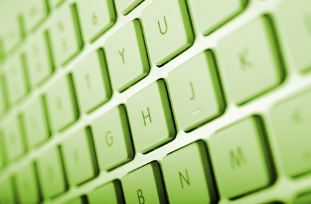 Computer Keyboard in Green Color Grading. Keyboard Closeup.の写真素材