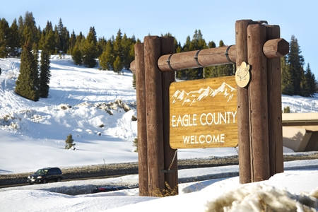 Eagle County Welcome Wooden Sign Located on Vail Pass Summit in Colorado Rocky Mountains.のeditorial素材