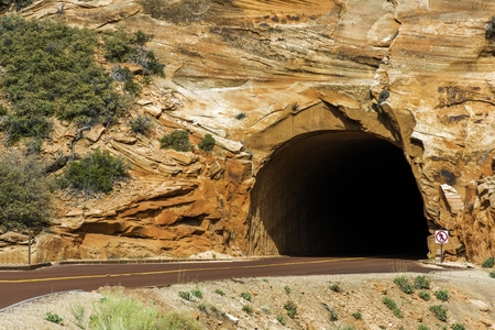 Road Tunnel in Utah State, USA. Sandstone Rock Formation Tunnel.の写真素材