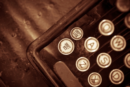 Aged Typewriter Closeup Photo. Sepia Color Grading.の写真素材