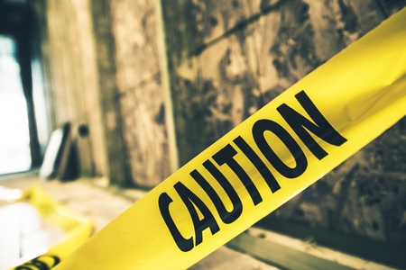 Yellow Caution Tape Closeup. Constriction Zone Safety.の写真素材