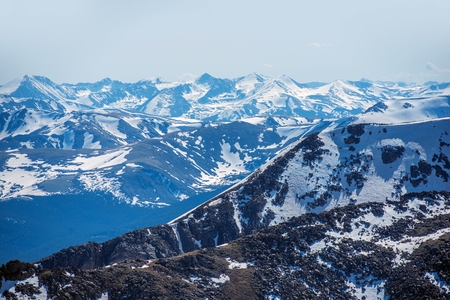 Spring Mountain Range Covered by Snow. Colorado Rockies Panorama