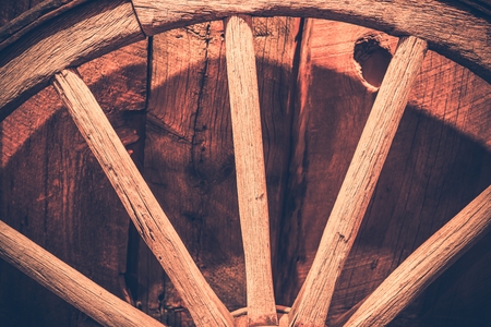 Aged Wooden Wagon Wheel Closeup Photo.の写真素材