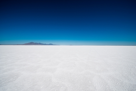 Salt Flats in Utah. Salt Flats Landscape. Dark Blue Sky and Snow White Salt Soil. Boneville near Salt Lake City, Utah, United States. Bonneville Salt Flatsの写真素材