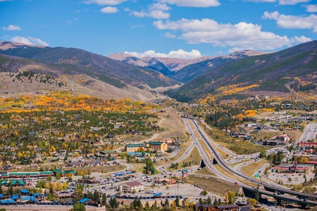 Silverthorne and Dillon Cities in Colorado. Cities Panorama with I-70 Interstate Highway in the Middle. Early Fall Time.の写真素材