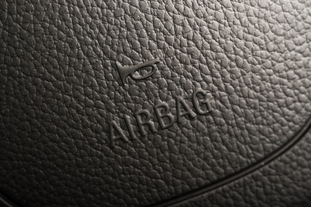 Steering Wheel Airbag Symbol Closeup Photo. Car Safety Feature.の写真素材