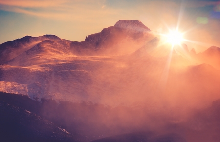 Sunny Winter Mountain Landscape with Blowing Snow. Colorado Rocky Mountains, Colorado, United States.