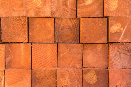 Square Wood Logs Stack Background. Wood Logs Pile. Wood and Carpentry Industry