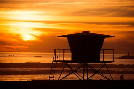 Lifeguard Tower Sunset Silhouette Scenery. California, Oceanside Beach at Sunset.の写真素材