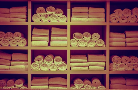 Resort Swimming Pool Towels Wooden Square Rack Closeup.の写真素材