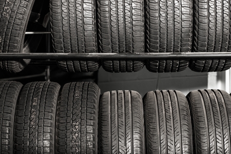Large Metal Tires Rack. Modern Car Tire Service and Sale.の写真素材