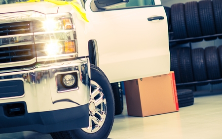 Tire Replacing Service. Pickup Truck in the Tire Service.のeditorial素材