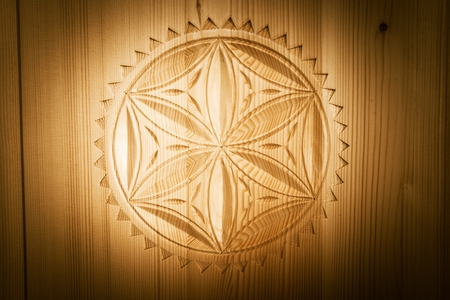 Polish Highlanders Style Wood Craving. Decorative Raw Wood Craving Closeup.の写真素材