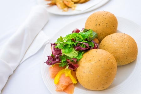 Fresh Salmon Breakfast with Freshly Baked Wheat Rolls. Delicious Breakfast.