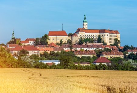 Mikulov Castle is Situated in The Town of Mikulov in South Moravia, Czech Republic. Mikulov Castle Summer Scenery with Rye Field.のeditorial素材