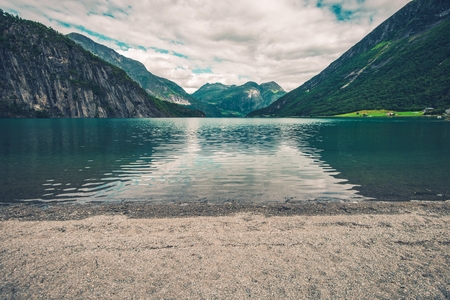 Glacial Lake Beach in Norway. Scenic Lake Place Near Stryn, Norway, Europe.の写真素材