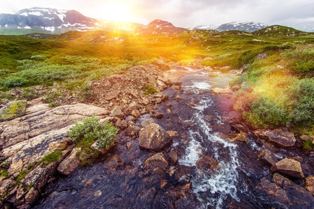 Spring Water. Scenic Mountain River with Sunset. Mountain Landscape.の写真素材