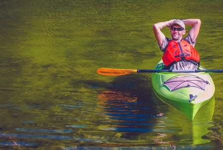 Relaxed Kayaker on the Lakeの写真素材