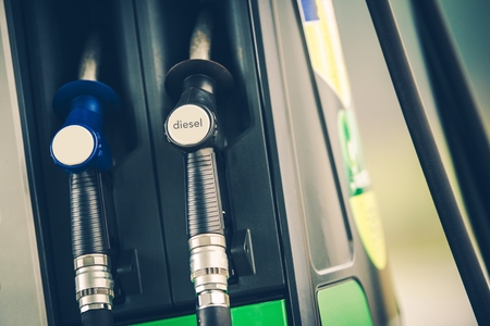 Gas Station Fuel Dispenser Closeup Photo. Car Refueling Concept Photo.の写真素材