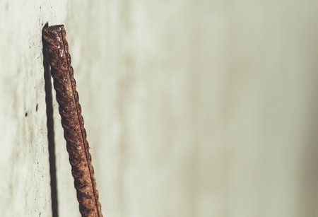 Rebar Reinforcement Steel Bar Leaning Against a Wall. Right Side Copy Space. Construction Concept.の写真素材