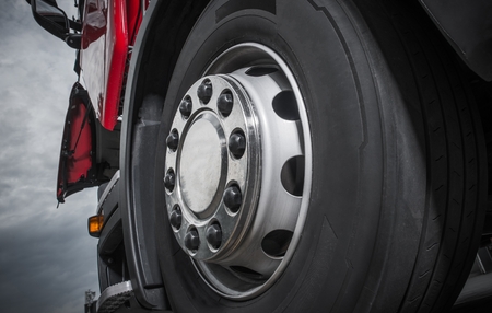 Chromed Truck Wheel Closeup. Heavy Duty Semi Truck Wheel.