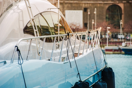 Modern Luxury Yacht Sailing. Vessel in the Marina Closeup Photo.の写真素材