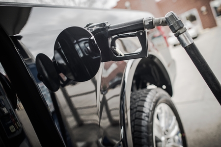 Pickup Truck Refueling and Gas Prices Concept. Transportation Theme.