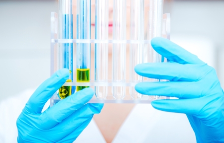Laboratory Research Concept. Biotechnology Worker with Lab Glasses Closeup Photo.