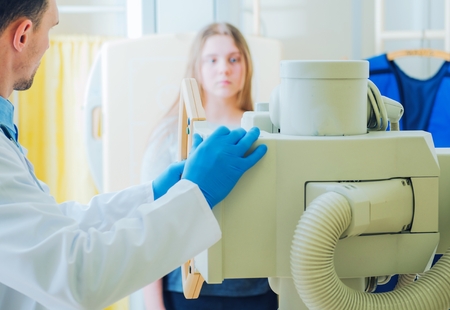 Girl During Xray Scanning in the Hospital. Healthcare Theme.