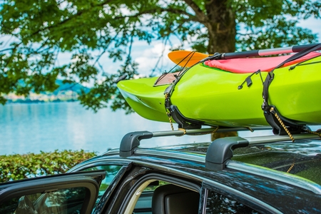 Vacation on the Water. Kayak on the Car Roof During Summer Vacation Trip.の写真素材