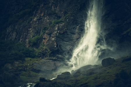 Scenic Norwegian Glacial Waterfall. Raw Norway Scenery.