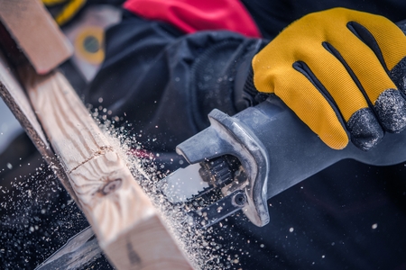 Reciprocating Saw Closeup Photo. Power Tool Wood Cutting. Construction Industry.の写真素材