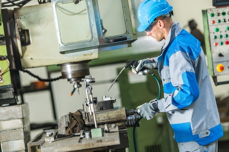 Metalworking Industry Job. Caucasian Lathe Operator Worker.
