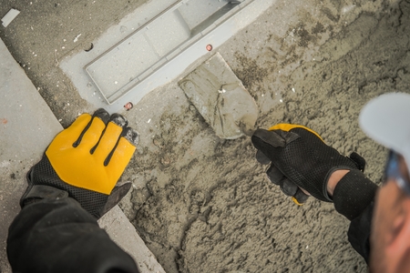 Bathroom Shower Floor Drain Installation by Caucasian Specialist.