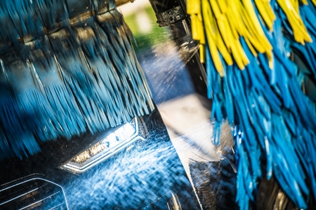 Pressure Washer and Brush Vehicle Cleaning. In the Car Wash.の写真素材