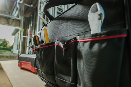 Contractors Tools Bag Closeup Photo. Construction Site Object.の写真素材
