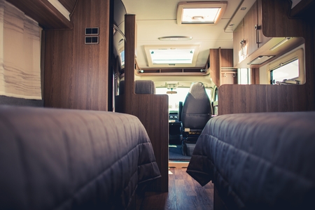 Traveling in the Camper Van. Modern Motorhome Interior. Vacation Time on the Road. Rving Theme.の写真素材