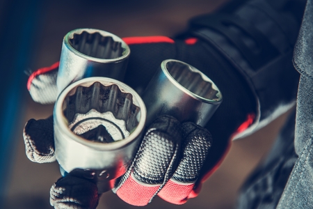 The Right Mechanics Tools in a Hand. Automotive and Mechanical Object. Hexagonal Sockets.