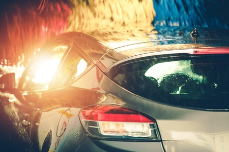 Colorful Car Wash Brushes. Vehicle Cleaning Time.の写真素材