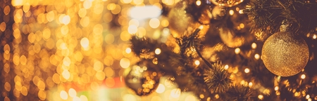 Golden Christmas Ornaments Photo Banner with Copy Space.の写真素材